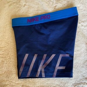blue Nike Pro spandex shorts